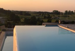 piscina interrata a sfioro